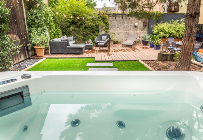 Maison à Brive-la-Gaillarde - La Villa Oasis - Jacuzzi Maison à Brive-la-Gaillarde - La Villa Oasis - Jacuzzi